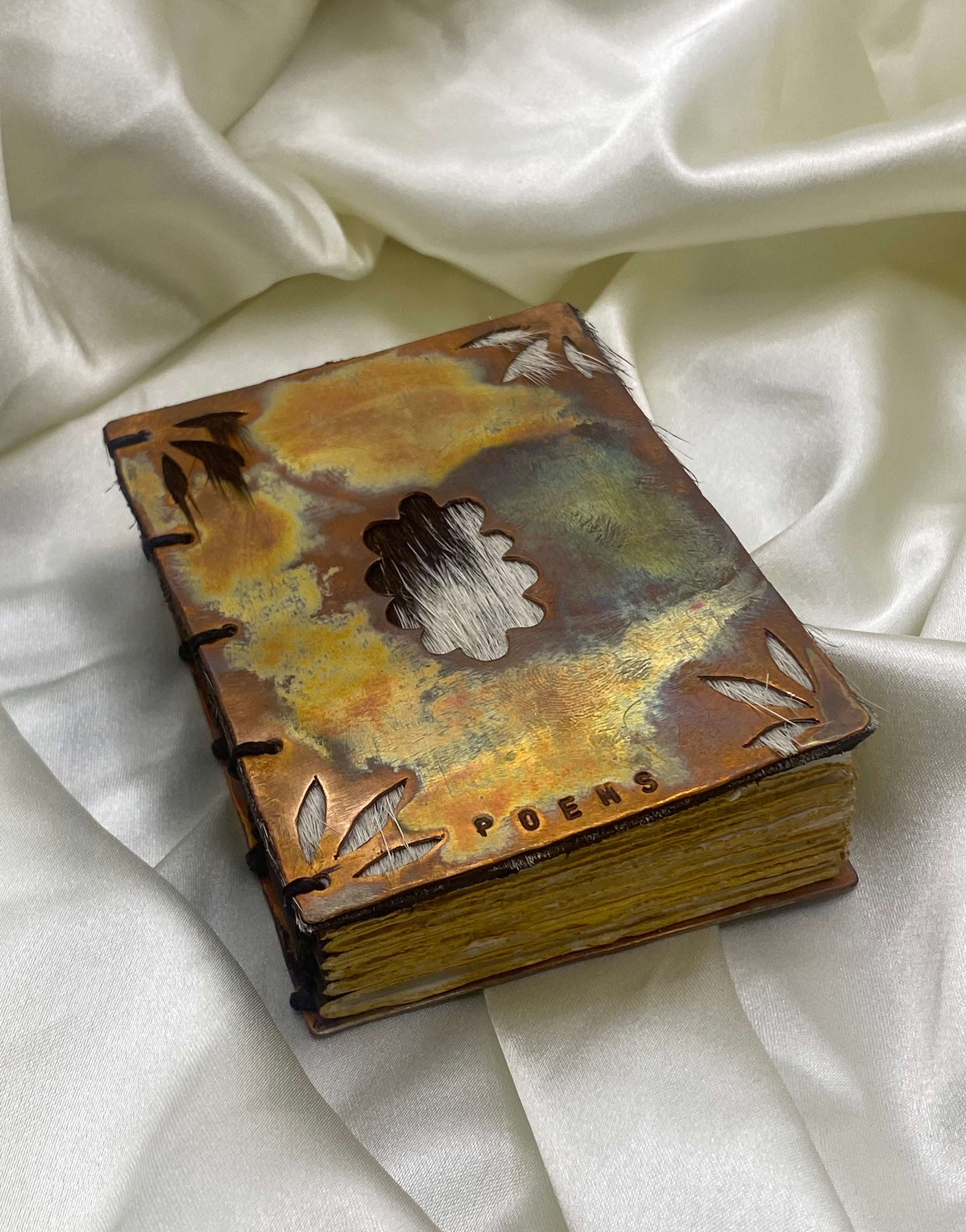 Pocket copper poem book